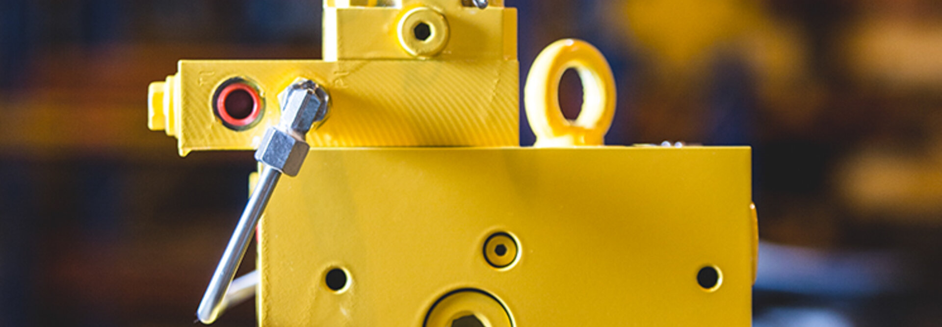 Close-up image of a yellow block, highlighting the details and texture of the surface.
