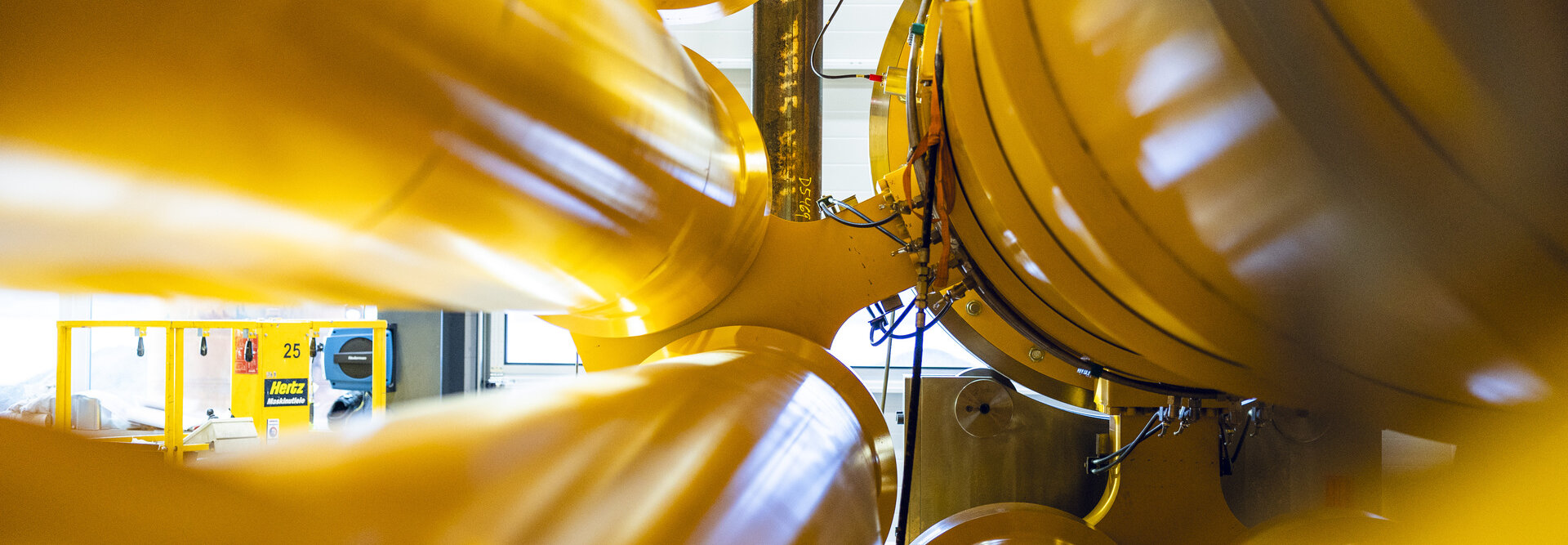 Image taken inside a hydraulic damper showing a manifold solution where two and two accumulators are attached together